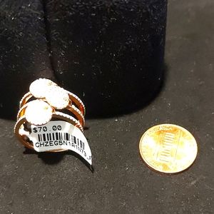 Sterling silver ring dipped in 14k Pink gold with faceted cz.